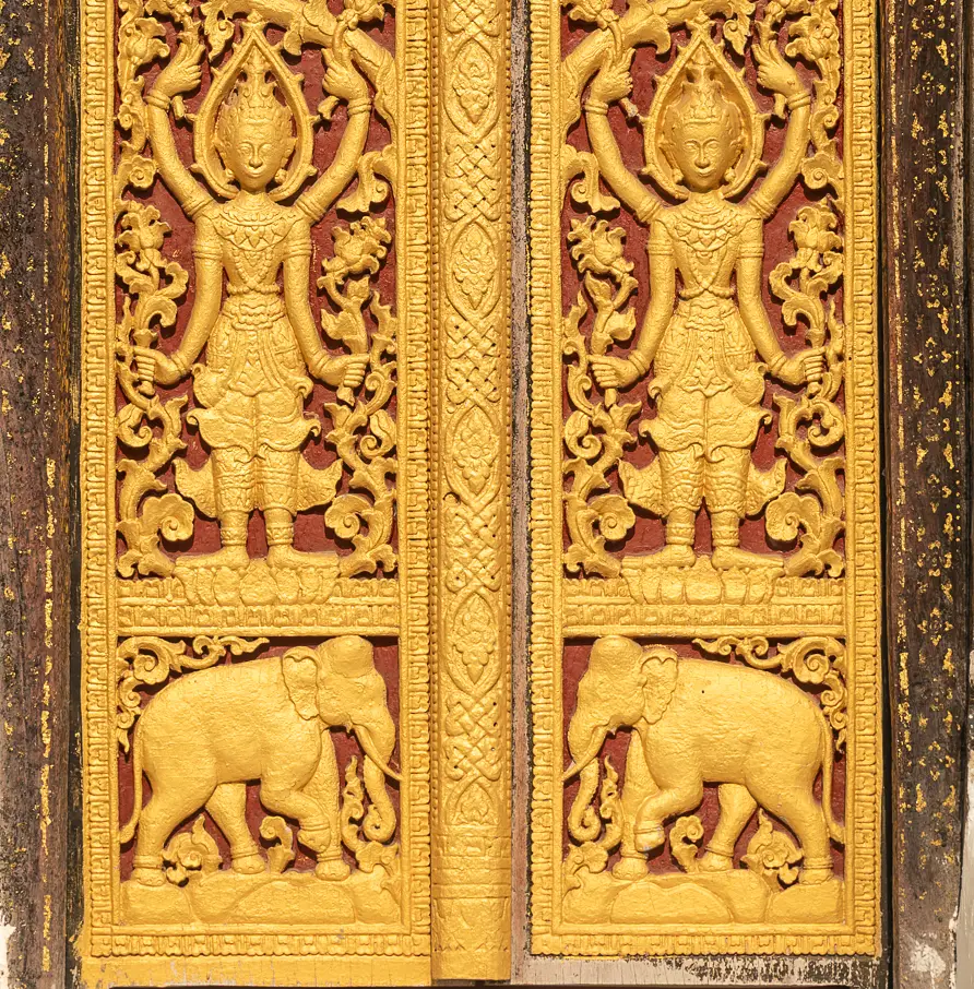 Elephants on door of Wat Xieng Thong Luamg Prabang