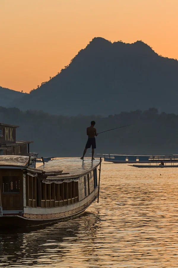 Photograph the Mekong sunset on a Laos Festival Photo Tour