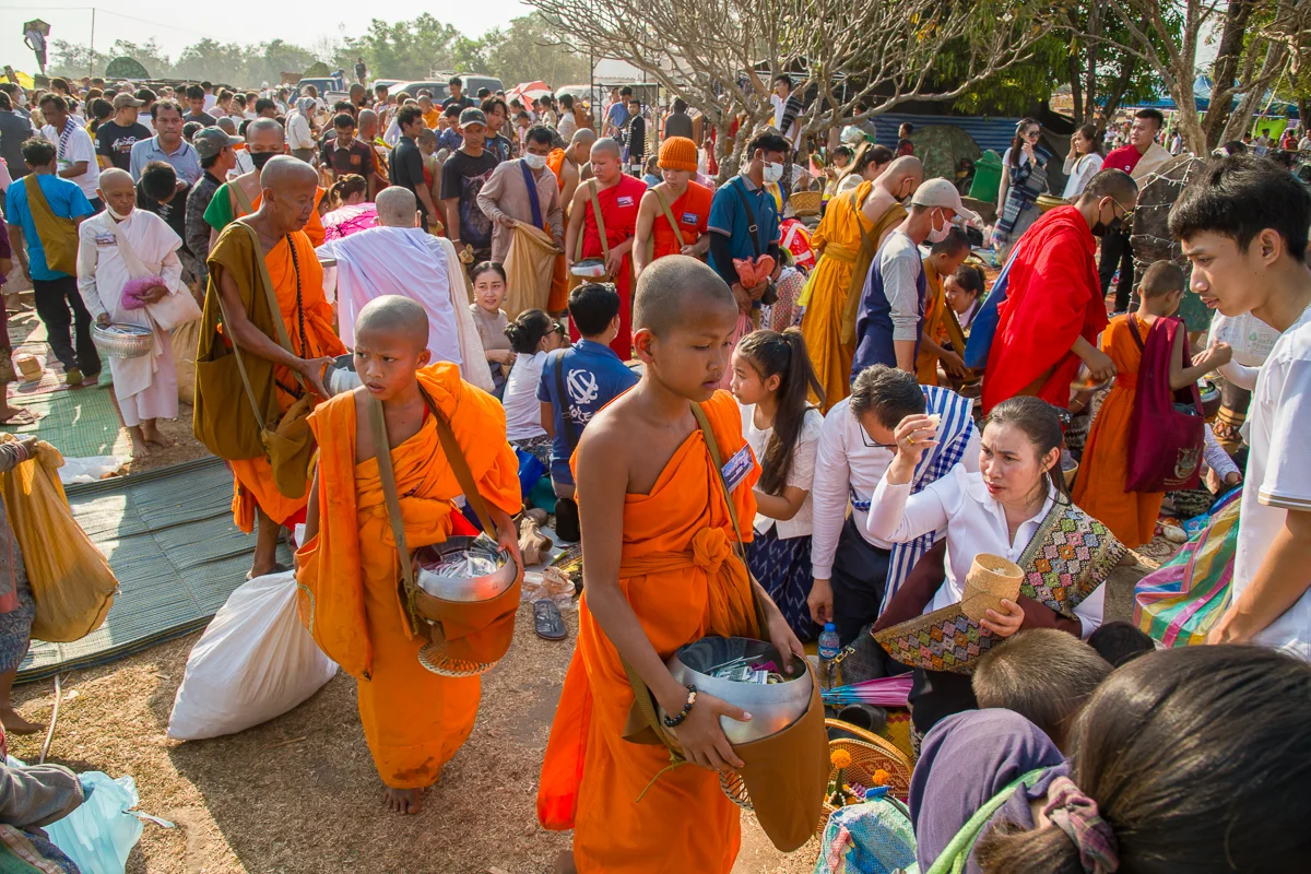 Photography Wat Phou Champassak monks alms round - Laos Festival Photography Tour